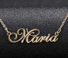 Gold Maria nameplate necklace on a black display